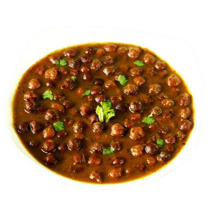 Home-cooked vegetarian curry from a Pooja Foods meal plan